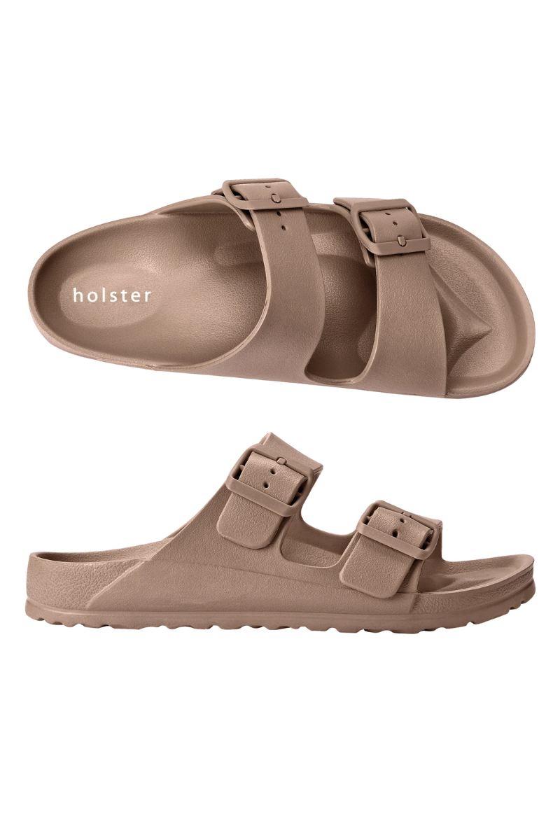 Brown sandals with 'holster' branding on a white background