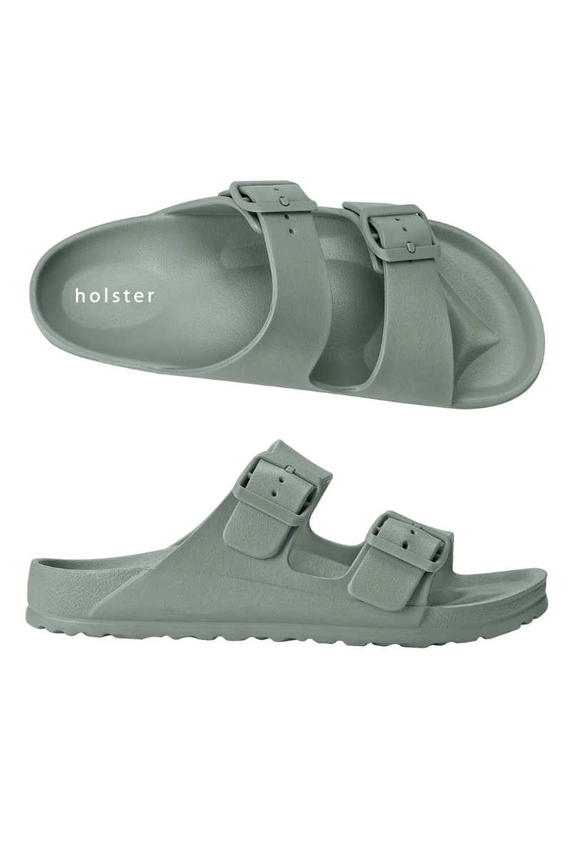 Green sandals with 'holster' branding on a white background