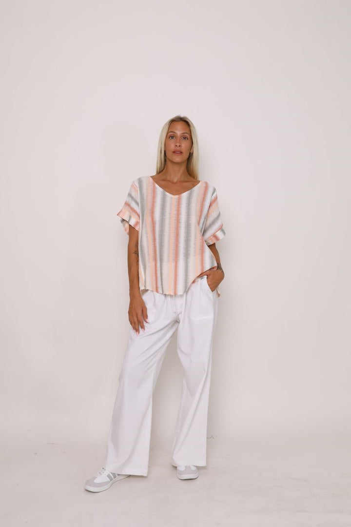 Front view of the Indrah Top in a striped pattern from Ivy Vibe, featuring a relaxed fit, round neckline, and short sleeves with soft drape.