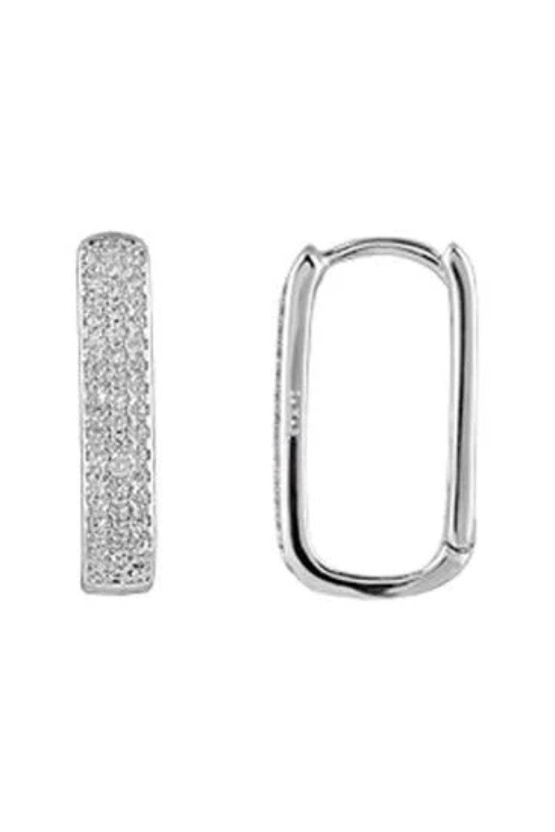 The Macey Earrings in Silver by Zahar feature a sleek, teardrop-inspired design with a polished finish, offering timeless elegance for any occasion — available at Ivy Vibe.
