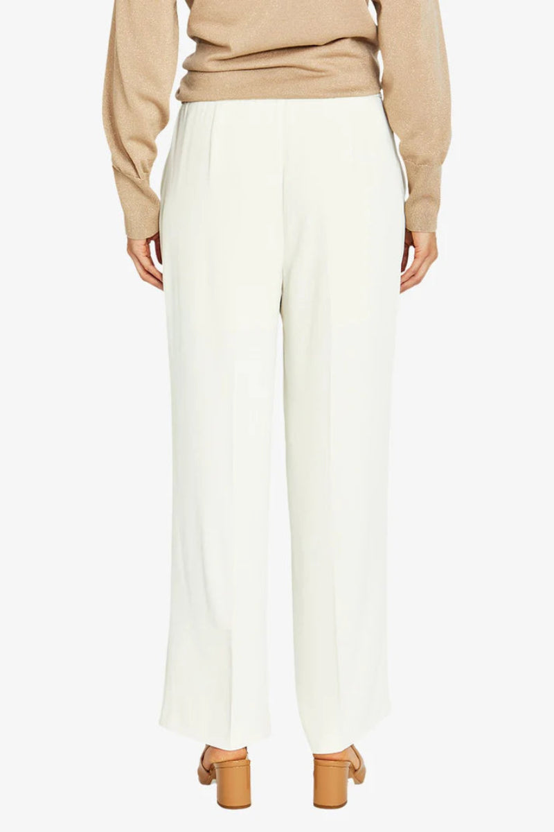 woman wearing Pingpong Chloe Crepe Pant in Cream