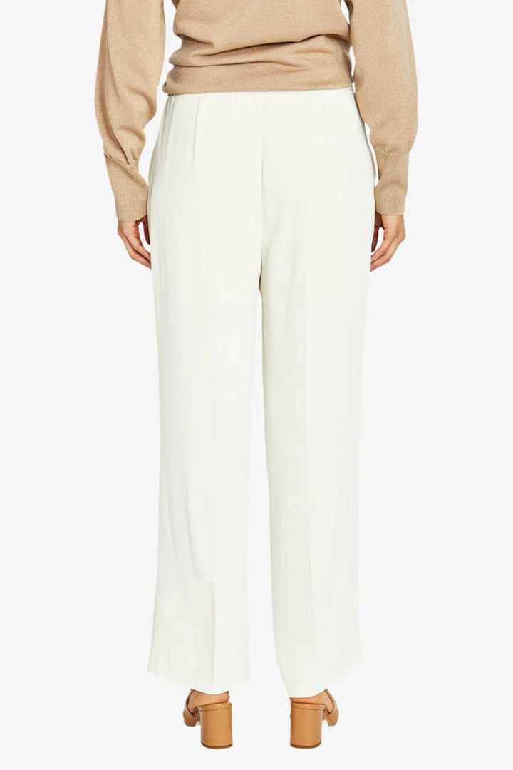 woman wearing Pingpong Chloe Crepe Pant in Cream