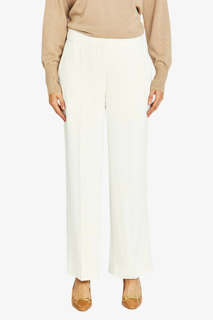 woman wearing Pingpong Chloe Crepe Pant in Cream