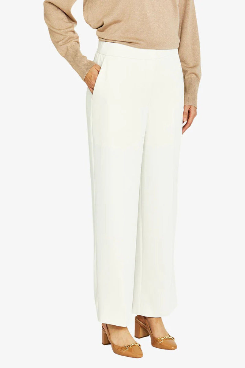 woman wearing Pingpong Chloe Crepe Pant in Cream