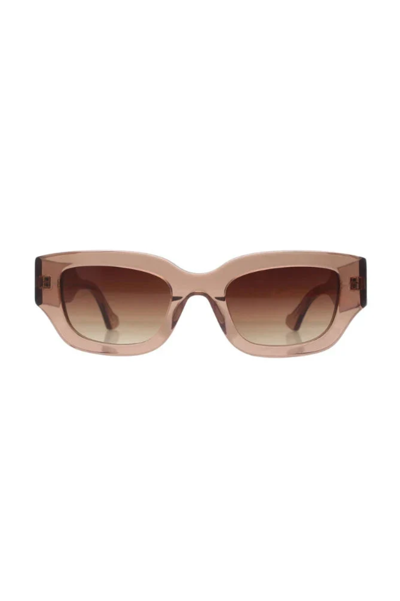 Sunglasses with a gradient brown lens on a white background