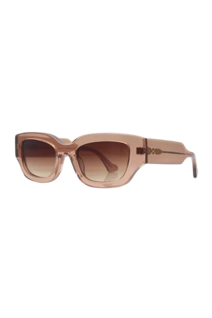 Sunglasses with a gradient brown lens on a white background