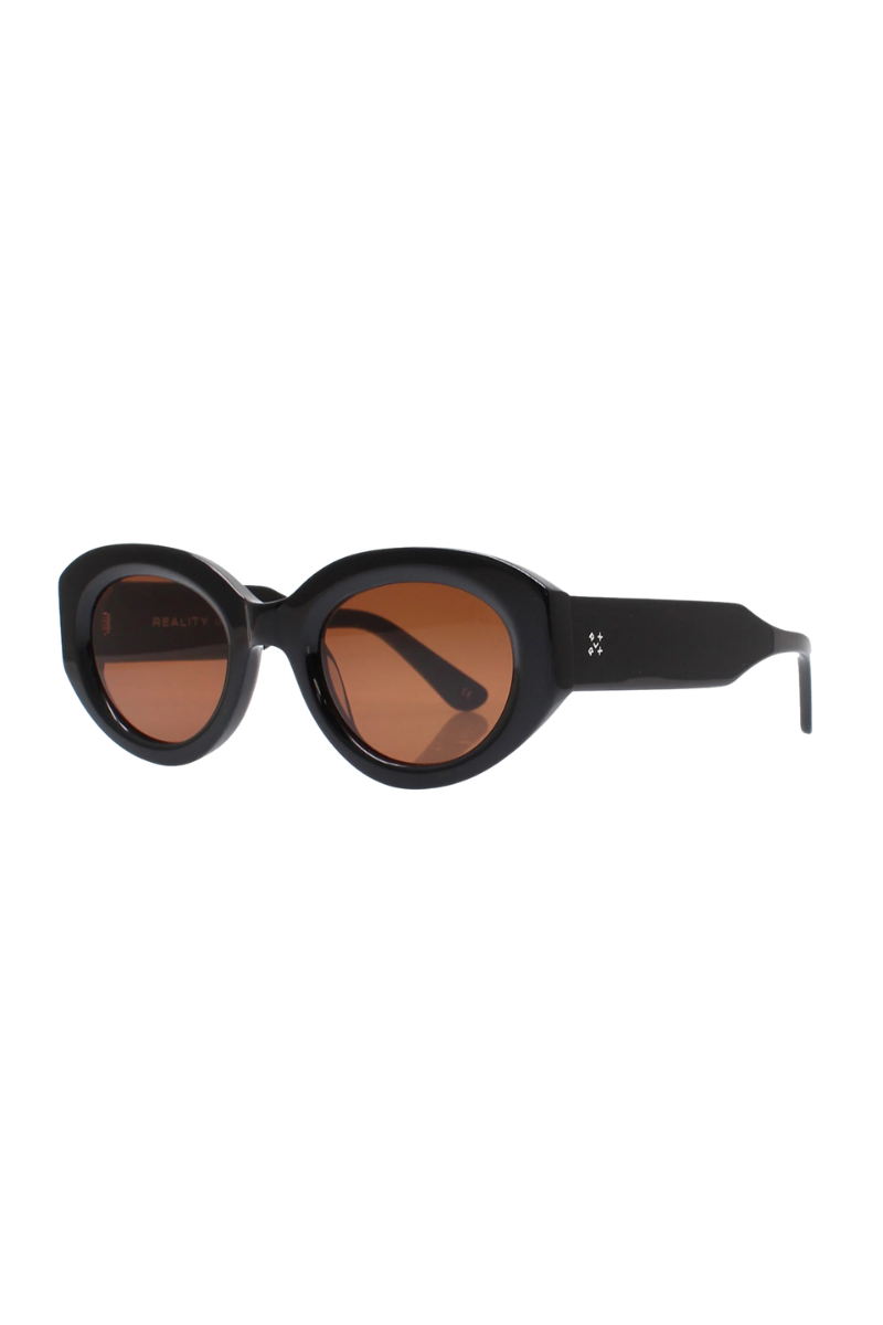 Oval sunglasses with a thick black frame and warm brown lenses, shown from a side angle on a plain white background.
