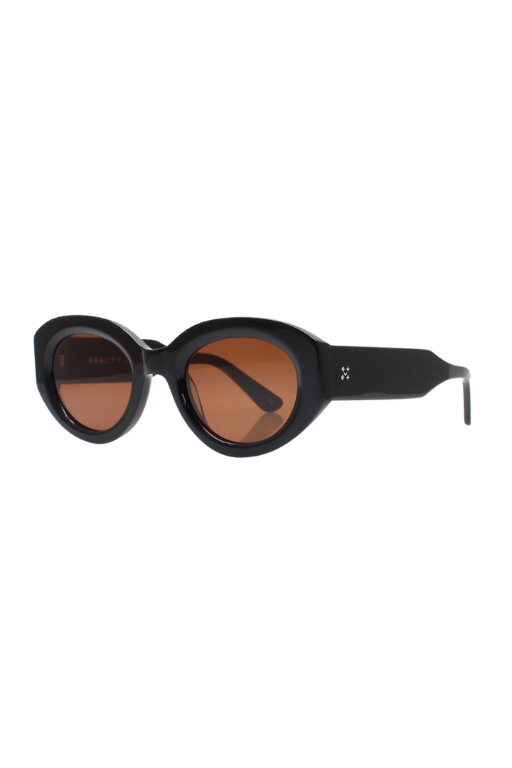 Oval sunglasses with a thick black frame and warm brown lenses, shown from a side angle on a plain white background.