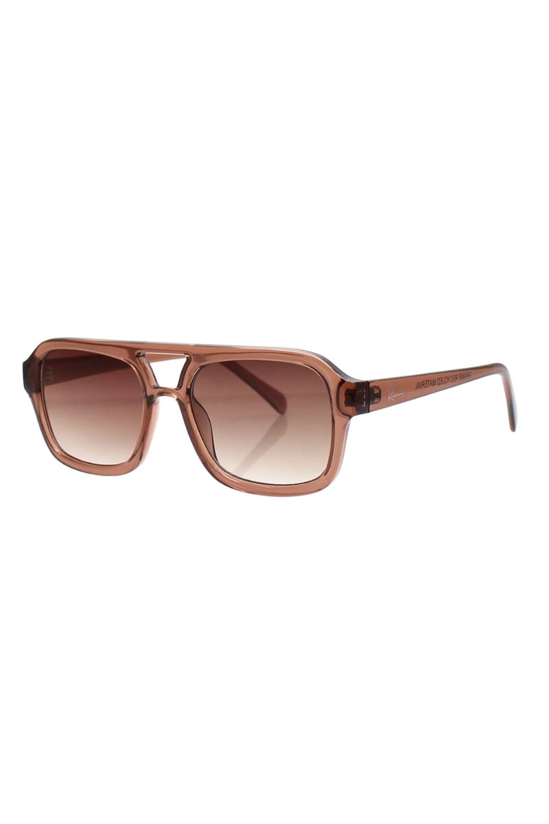 A pair of square aviator-style sunglasses with a translucent copper-brown frame and gradient brown lenses, shown on a plain white background.