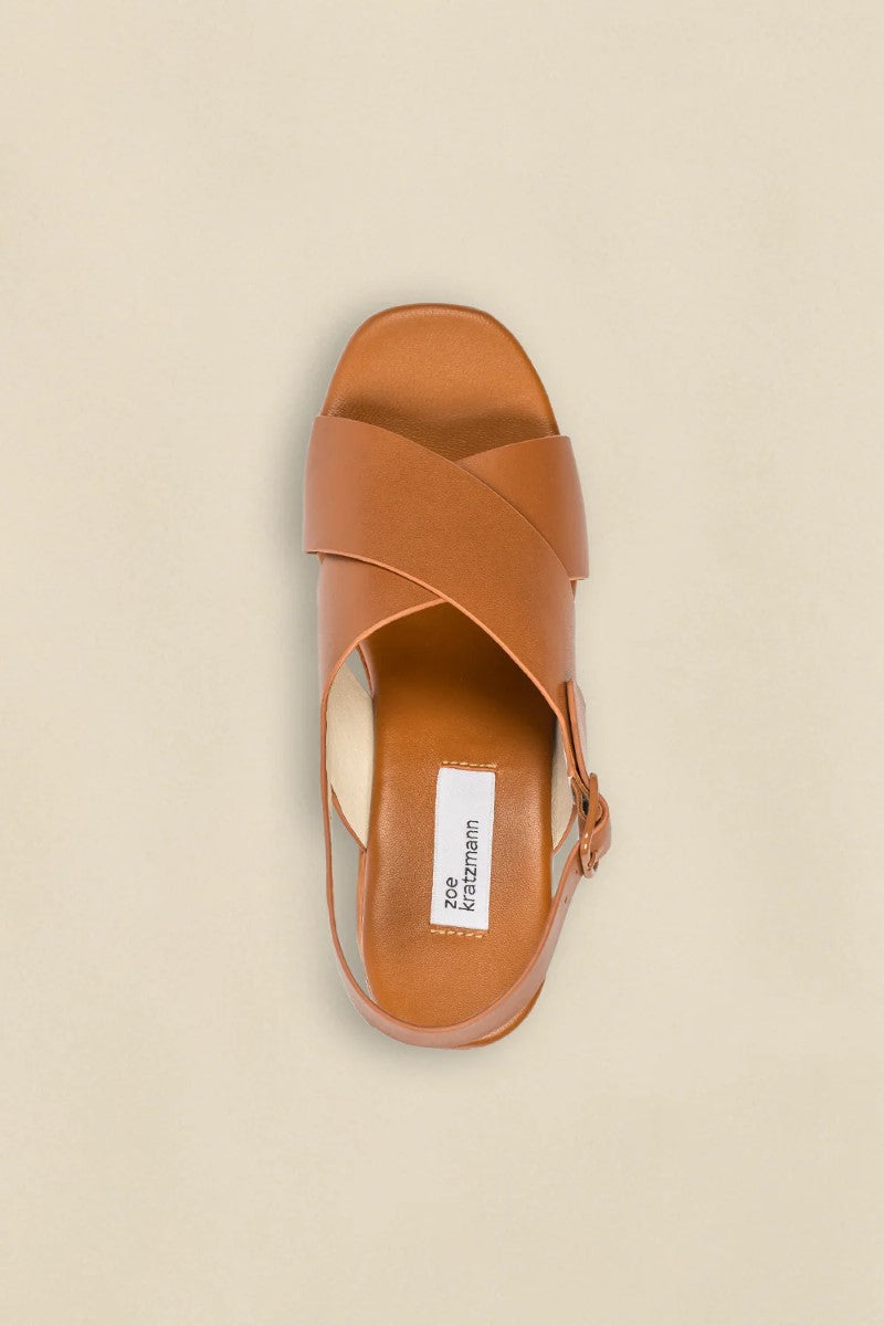 Top view of the Revel Heel in Saddle, showcasing the rounded toe design and smooth leather finish.