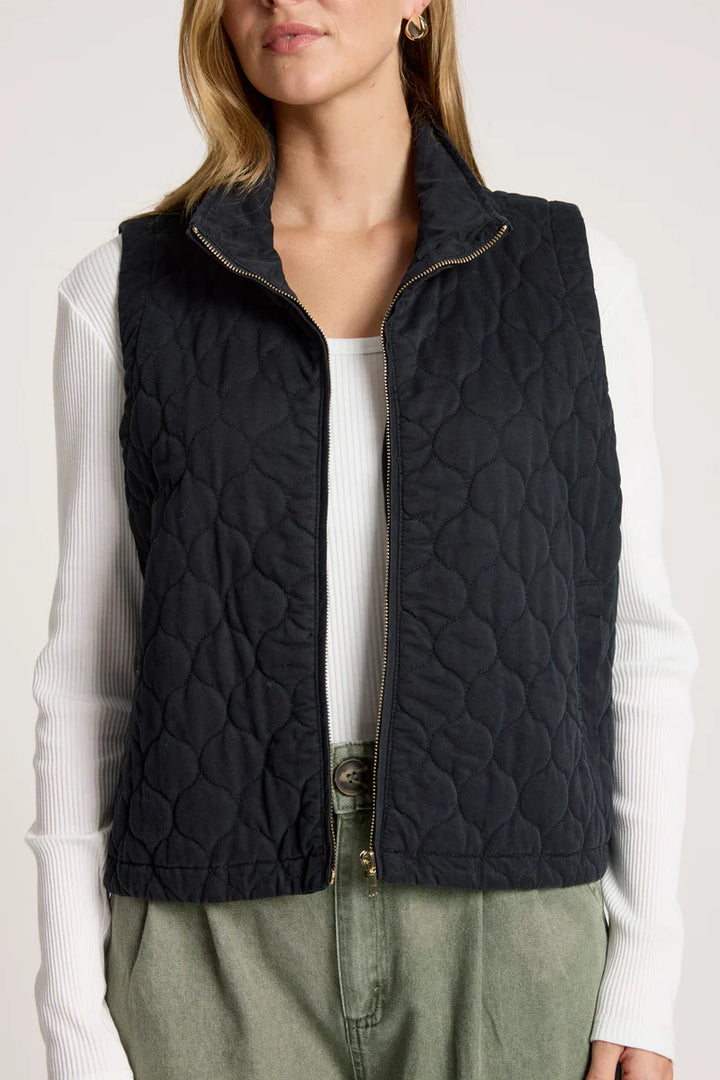 woman wearing Sansi Quilted Crop Vest  in Black