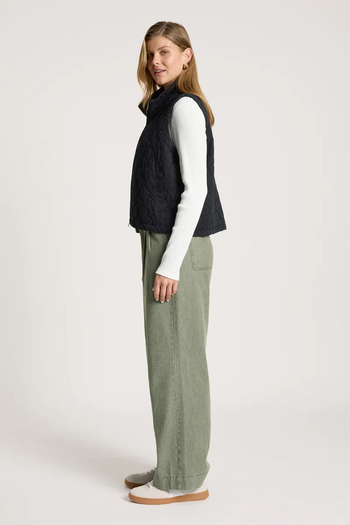 woman wearing Sansi Quilted Crop Vest  in Black