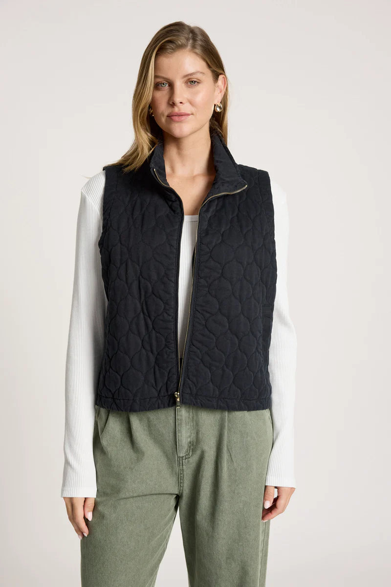 woman wearing Sansi Quilted Crop Vest  in Black