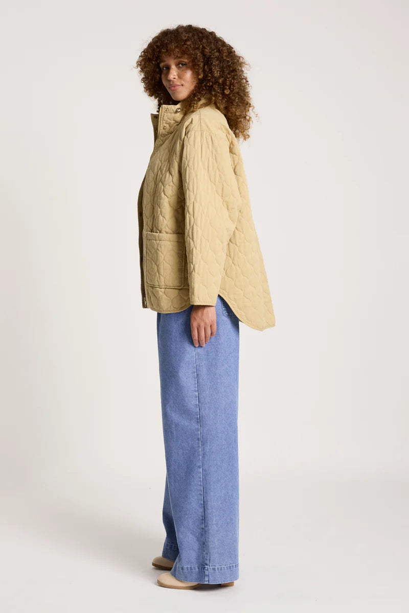 woman wearing Sansi Quilted Jacket in Dune