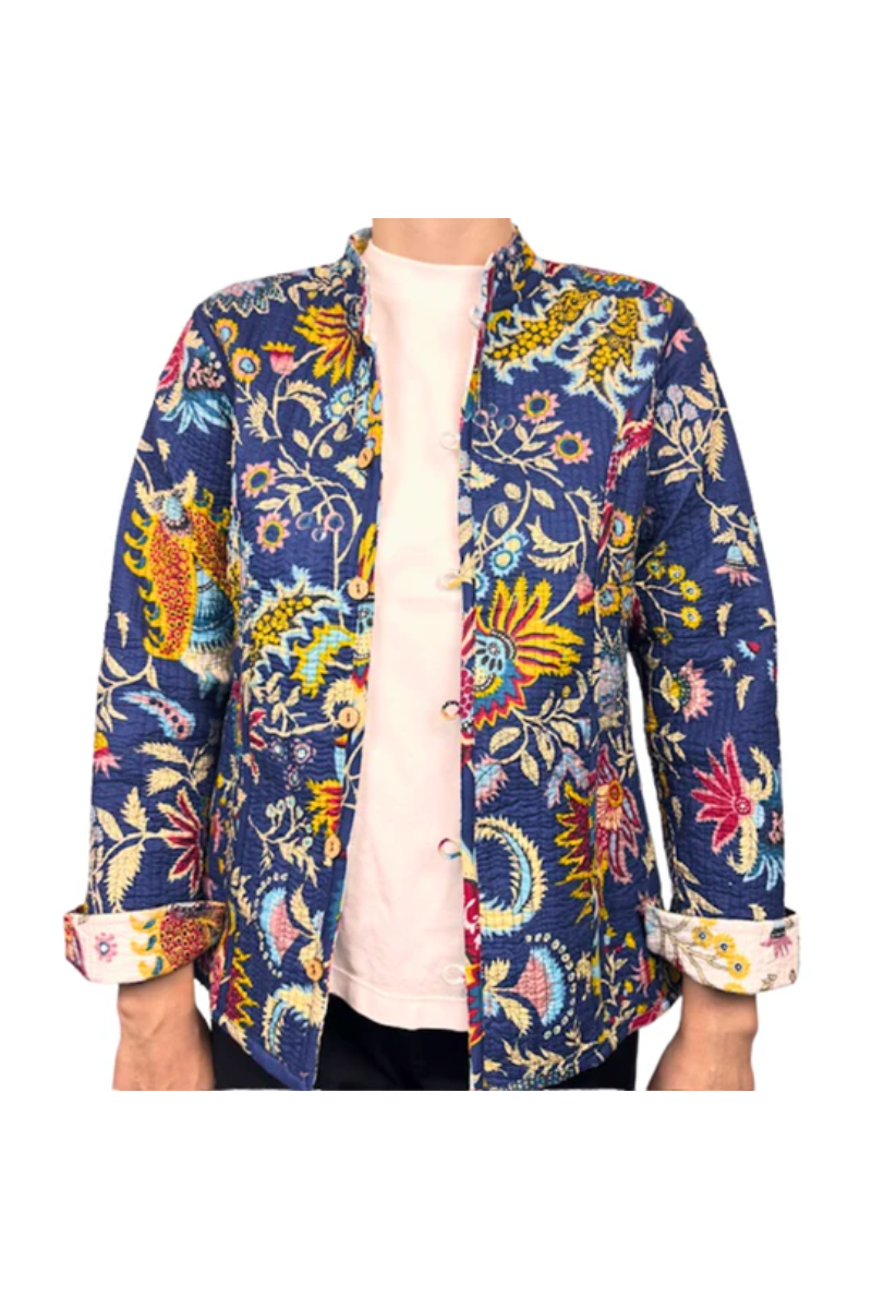 Navy blue floral patterned shirt with colorful designs on a white background