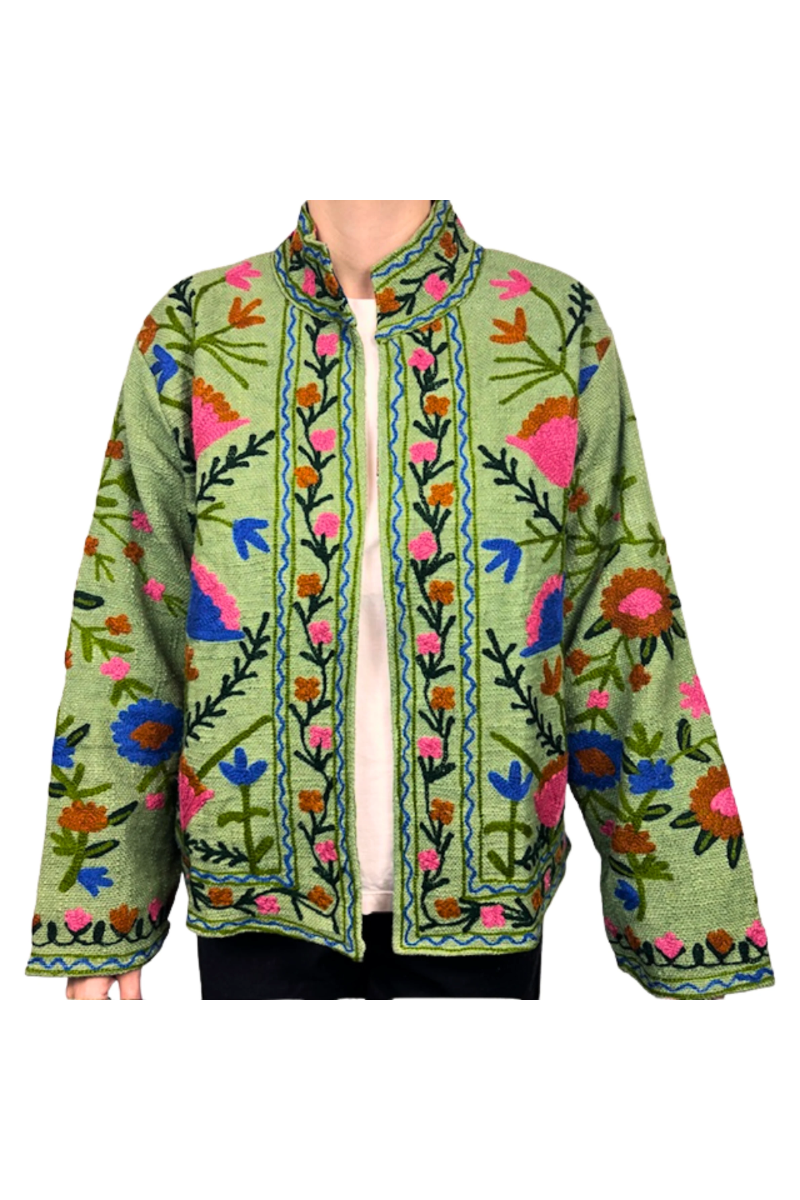 Green embroidered jacket with colorful floral patterns on a white background