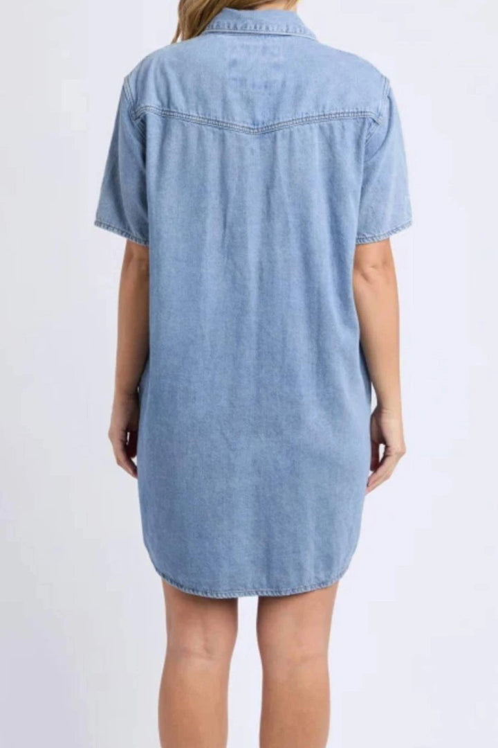 Light blue denim dress worn by a person on a white background
