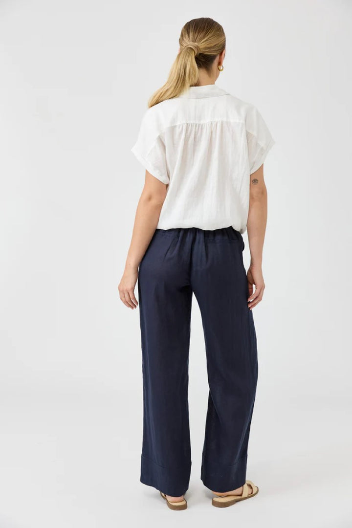  Back view of Studio Tie Shirt in salt color, showing a relaxed fit and smooth fabric, from Ivy Vibe Boutique.
