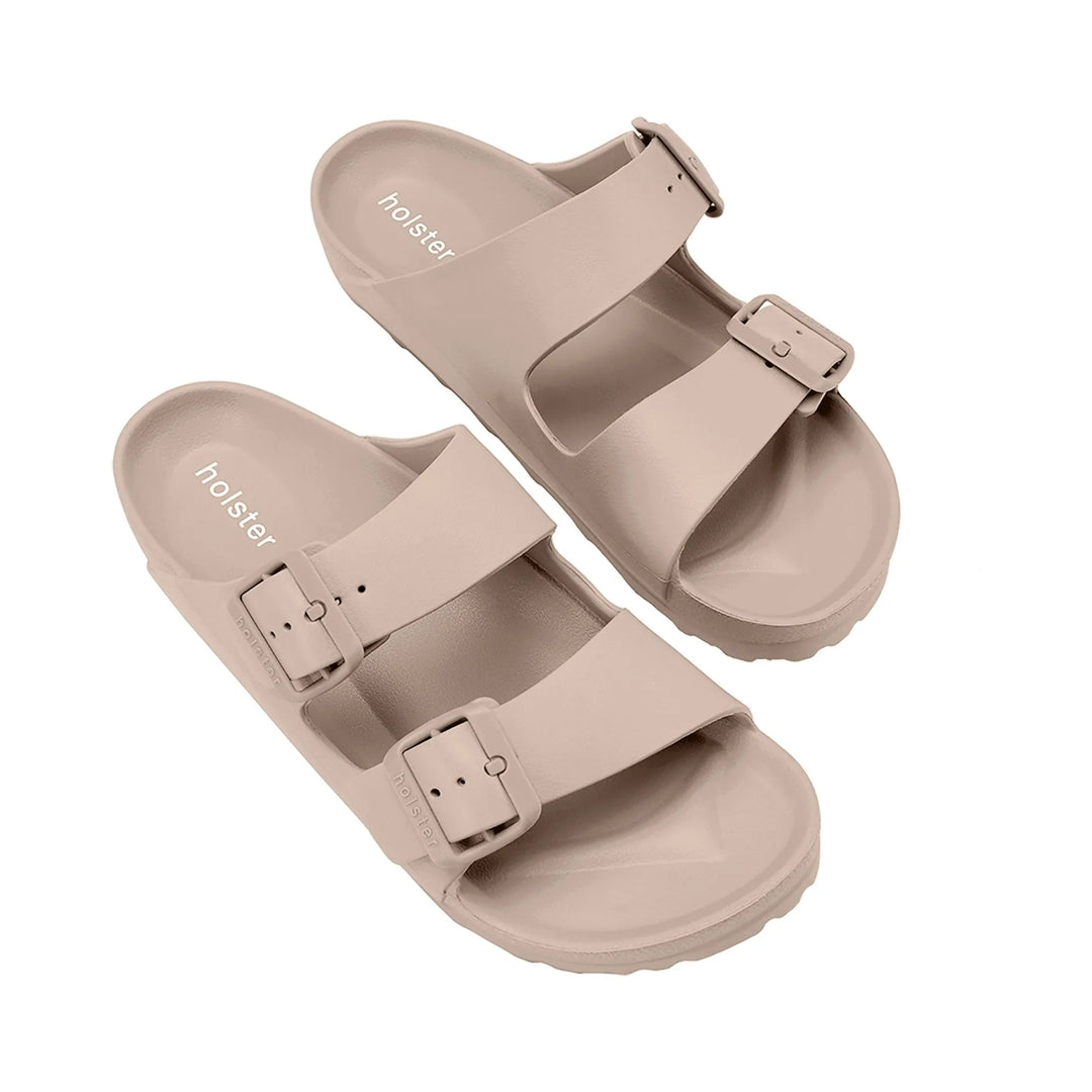 Top-down point of view of the Sundreamer Slide in beige, highlighting the wide strap, cushioned footbed, and streamlined design.