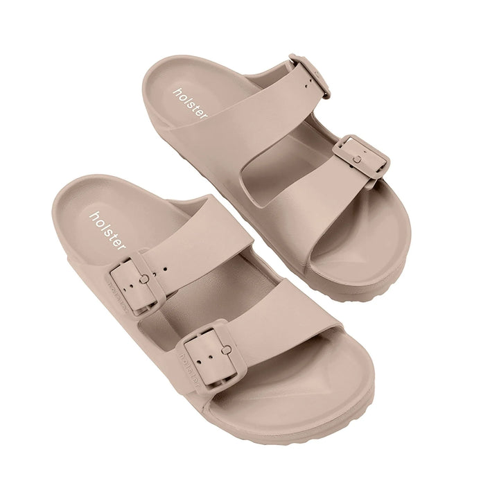 Top-down point of view of the Sundreamer Slide in beige, highlighting the wide strap, cushioned footbed, and streamlined design.