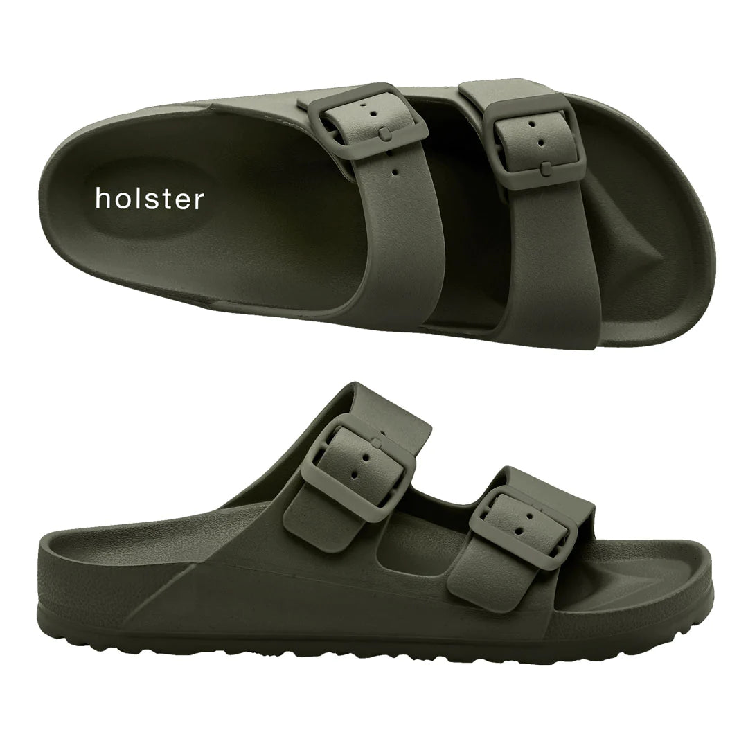 Front view of the Sundreamer Slide in khaki, featuring a wide strap and flat sole with a minimalist, modern design.