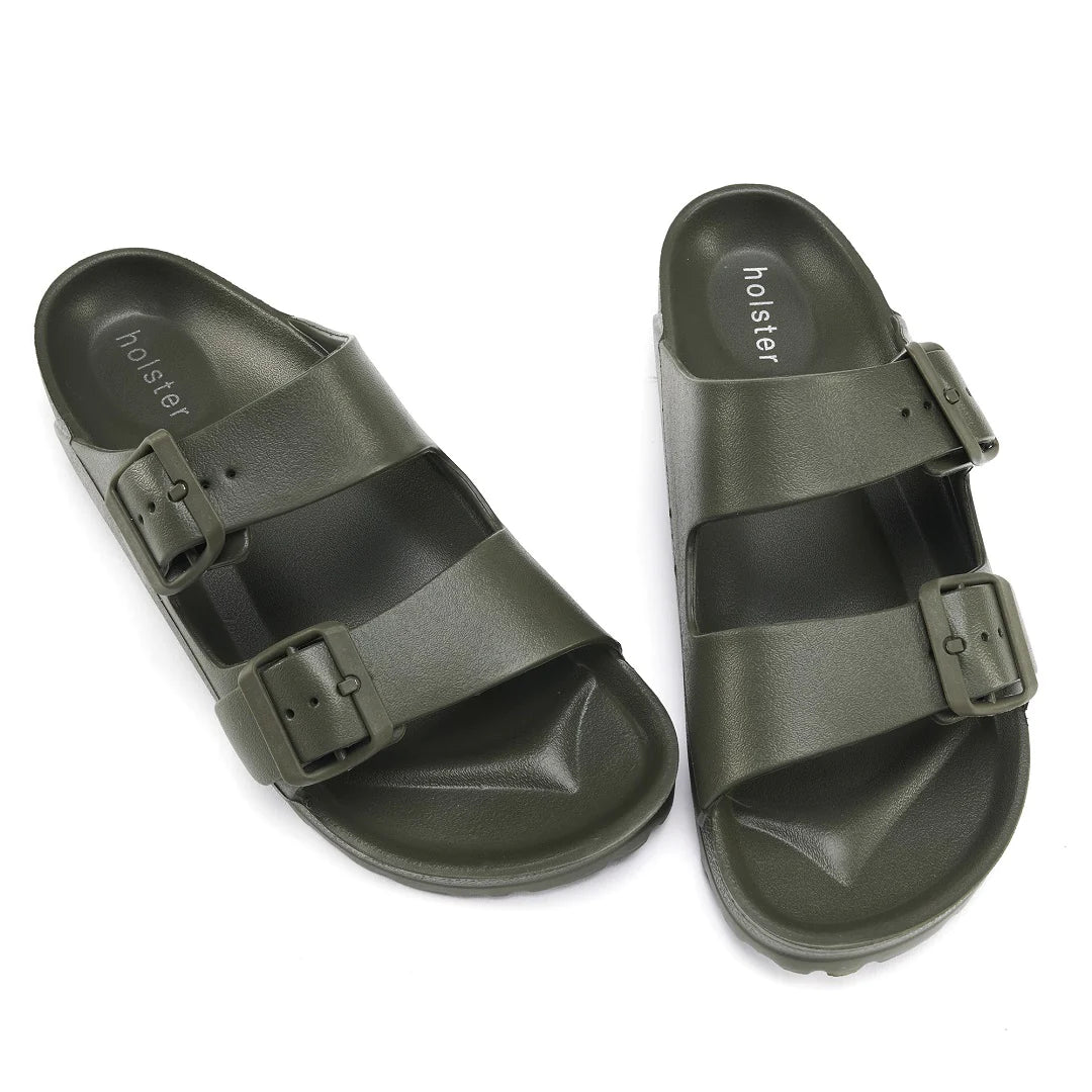 Top-down view of the Sundreamer Slide in khaki, showing the wide strap, cushioned footbed, and clean minimalist design.