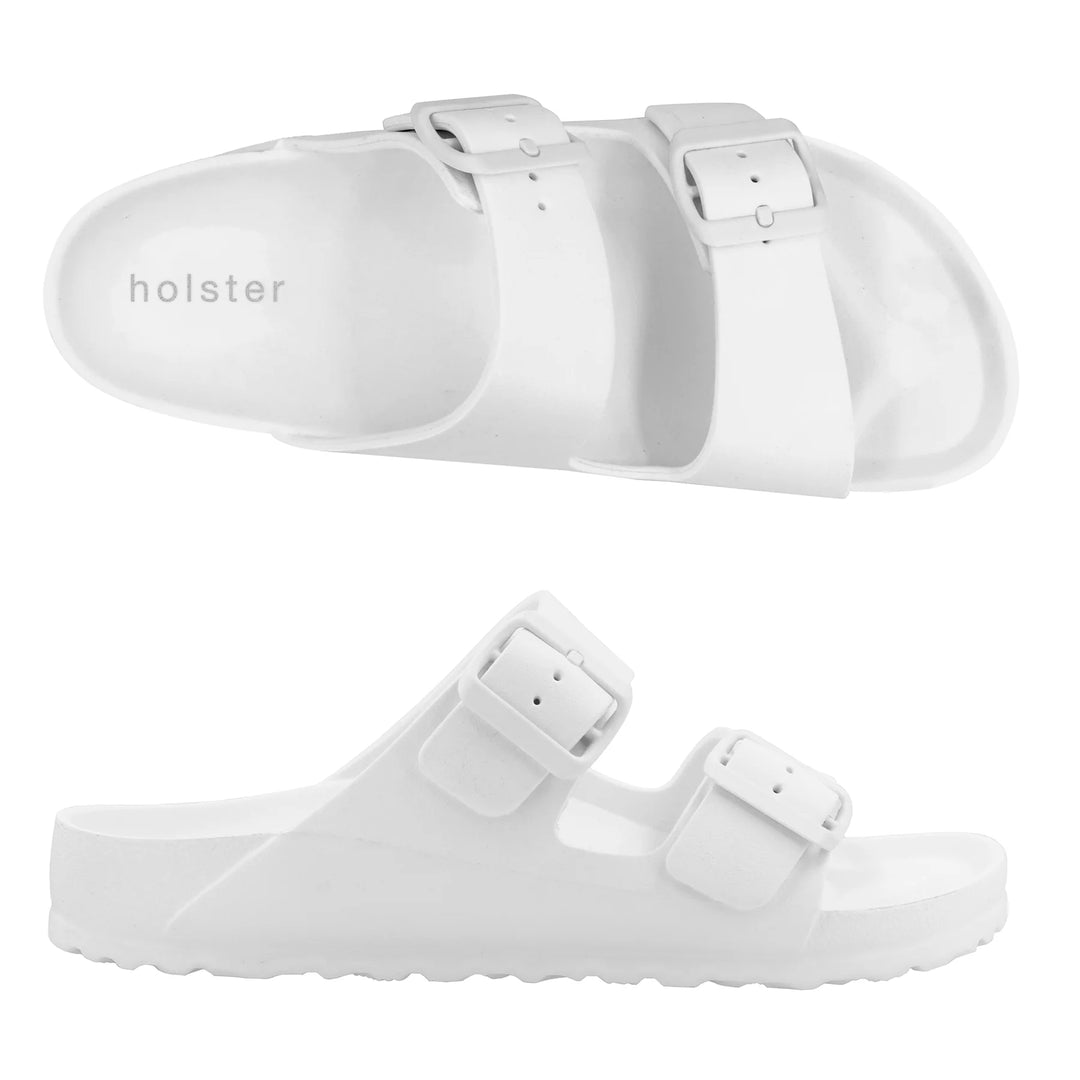 Front view of the Sundreamer Slide in white, featuring a wide strap and flat sole with a clean, minimalist design.