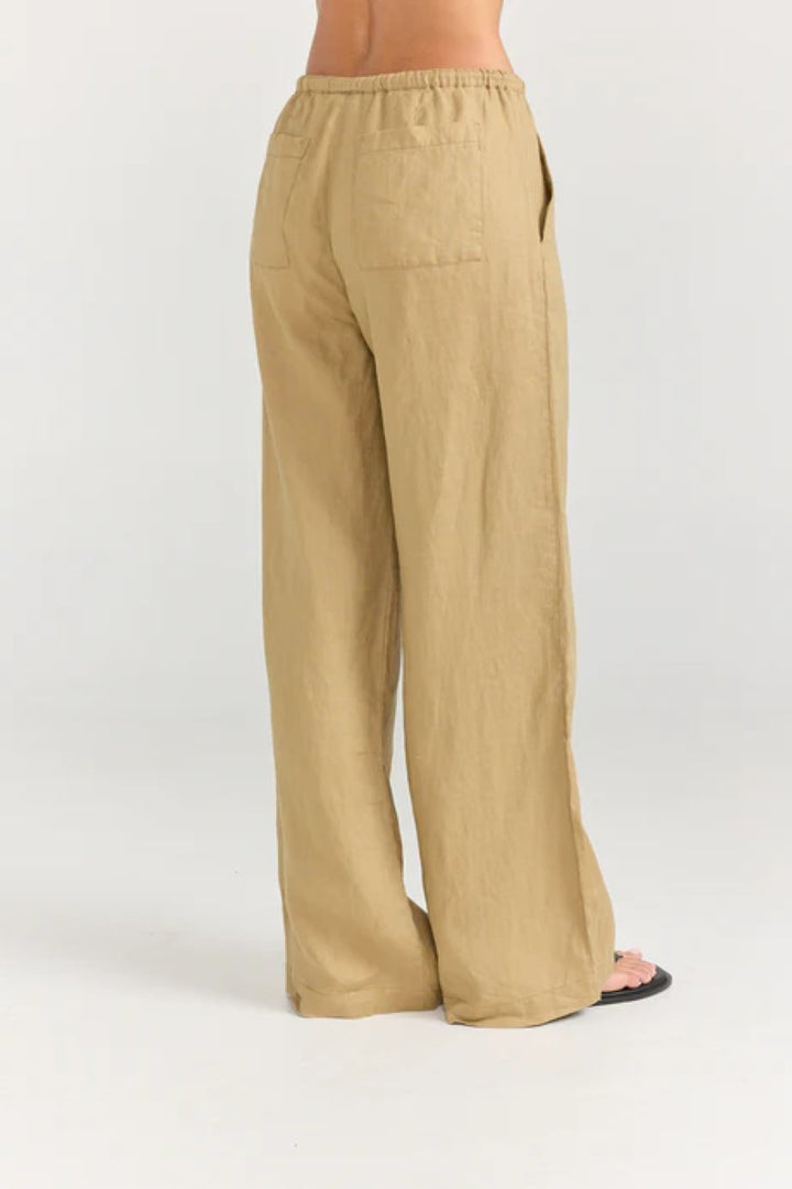 Beige wide-leg pants on a white background